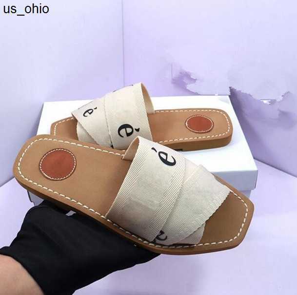 Slippers EE01 Newest Branded Women Woody Mules Fflat Slipper Deisgner Lady Lettering Fabric Outdoor Leather Sole Slide Sandal 02a2 J230520, Black
Slippers EE01 Newest Branded Women Woody Mules Fflat Slipper Deisgner Lady Lettering Fabric Outdoor Leather Sole Slide Sandal 02a2 J230520, Black