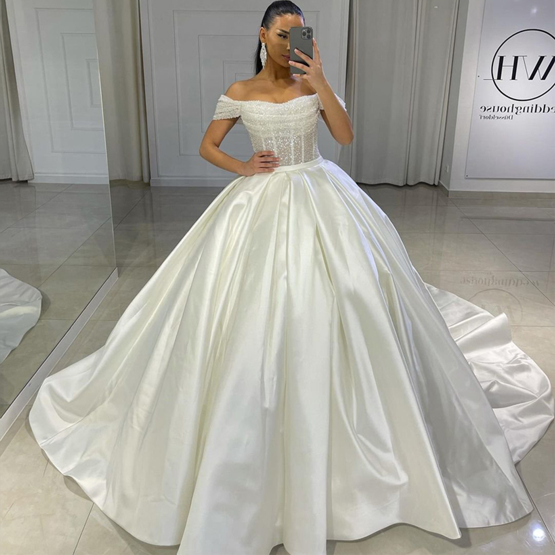 Stunning Bead Off the Shoulder Ball Gown Wedding Dresses Sequin Satin Princess Bridal Gown Pleat Plus Size Arabic Dubai Wedding Gowns for Bride