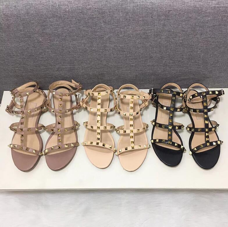 Rivet slippers women 2023 new flat one word with open toe outside wear beach shoes with rivets all-match flat heel leaking toe sandals