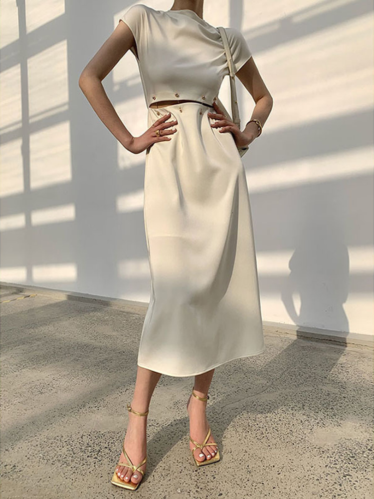 Basic Casual Dresses TWOTWINSTYLE Elegant White Long Dress Female Round Neck Short Sleeve High Waist Cut Out Midi For Woman Clothing Fashion 230522