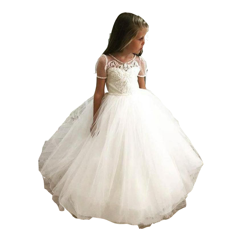 2023 White Simple Flower Girls Dresses For Weddings Jewel Neck Short Sleeves Lace Appliques Beads Long Floor Length Birthday Children Girl Pageant Gow