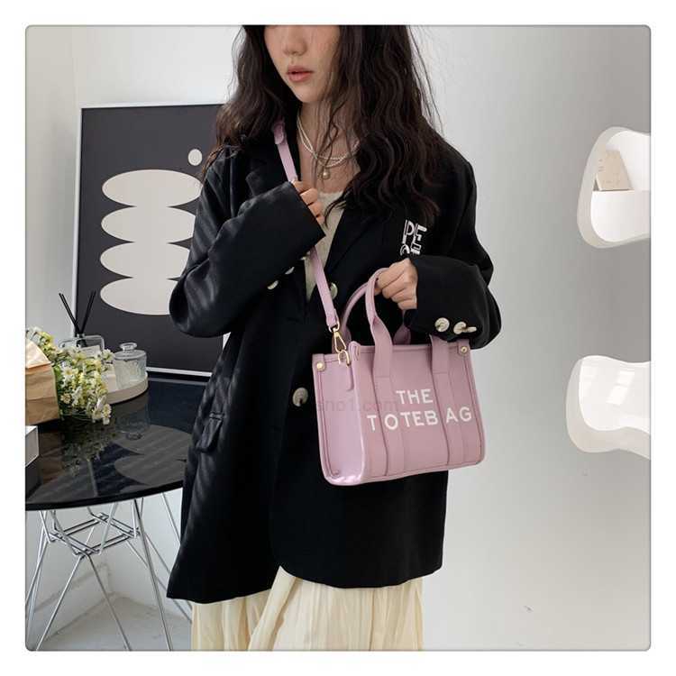 the Tote Marc Mini Tote Women's Springsummer New Trend Fashion Handbag Junior High Quality Bag Jacobsmxobjocobs, Black
the Tote Marc Mini Tote Women's Springsummer New Trend Fashion Handbag Junior High Quality Bag Jacobsmxobjocobs, Black