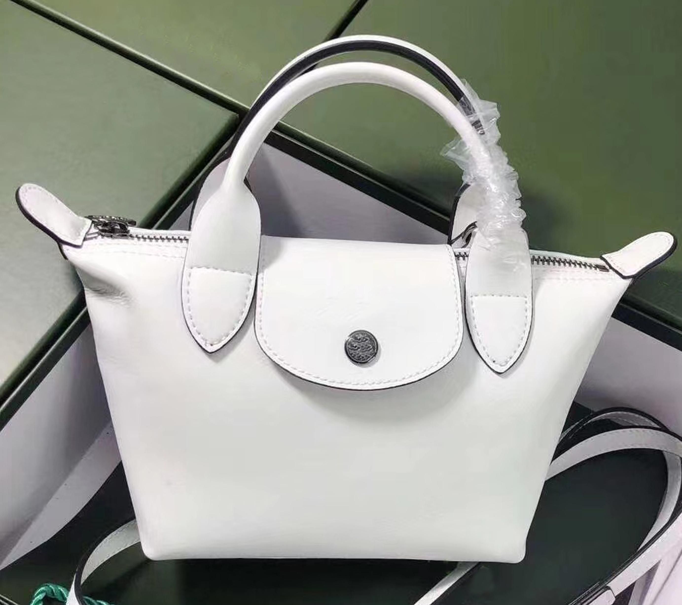 Handbags girl Women's Totes dumplings Bags champion Luxurys Designers LONG Le Pliages Club 70 sheepskin leather anniversary handbag Shoulder L2605619
Handbags girl Women's Totes dumplings Bags champion Luxurys Designers LONG Le Pliages Club 70 sheepskin leather anniversary handbag Shoulder L2605619