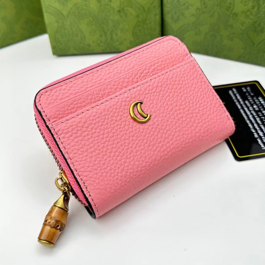 23ss Mens Womens Short Wallets Solid Color Cowhide Card Holder Genuine Leather Handbag Luxurys Designers Bag Ladies Travel Wallet Coin Purse With original box, Black
23ss Mens Womens Short Wallets Solid Color Cowhide Card Holder Genuine Leather Handbag Luxurys Designers Bag Ladies Travel Wallet Coin Purse With original box, Black