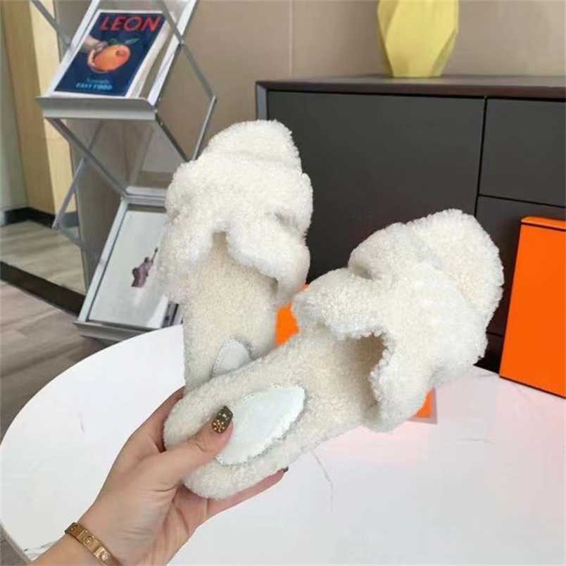Designer Women H flat sandals Fashion Leather Slippers 2022 Fur Slide Wool Women Warm Winter Home Sandals Comfortable Fuzzy Girl
Designer Women H flat sandals Fashion Leather Slippers 2022 Fur Slide Wool Women Warm Winter Home Sandals Comfortable Fuzzy Girl