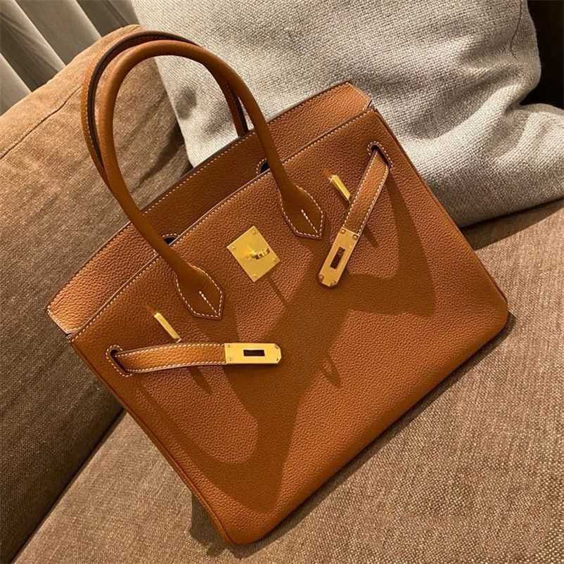Tote Birkin Bag h Erme 2023 Leather Women's Litchi Pattern Togo First Layer Cowhide Bride's Wedding Handbag Zc, Golden brown small
Tote Birkin Bag h Erme 2023 Leather Women's Litchi Pattern Togo First Layer Cowhide Bride's Wedding Handbag Zc, Golden brown small