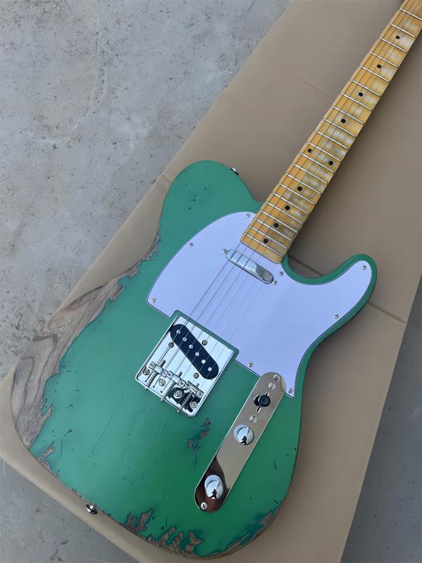 Heavy TL Electric Guitar Alder Beige Body Neck Aging Hardware Color Green Nitrocellulose varnish finish can be customized
Heavy TL Electric Guitar Alder Beige Body Neck Aging Hardware Color Green Nitrocellulose varnish finish can be customized