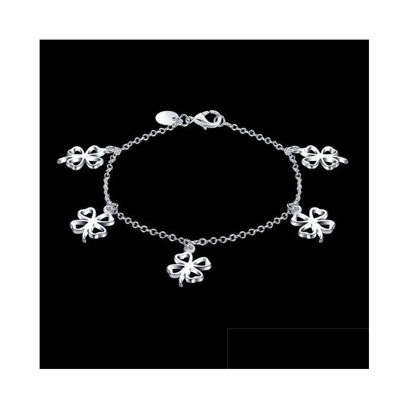 Charm Bracelets Womens Sterling Sier Plated Hanging Fourleaf Clover Bracelet Gssb185 Fashion 925 Plate Jewelry Drop Delivery Dhnbl
Charm Bracelets Womens Sterling Sier Plated Hanging Fourleaf Clover Bracelet Gssb185 Fashion 925 Plate Jewelry Drop Delivery Dhnbl