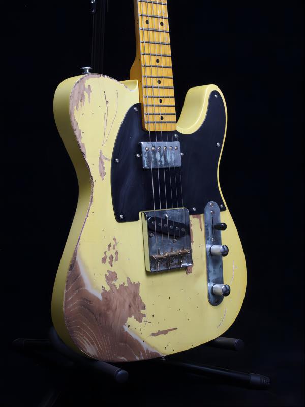 Relic TL electric guitar, maple fingerboard, chrome hardware, cream-like color, solid alder guitar
Relic TL electric guitar, maple fingerboard, chrome hardware, cream-like color, solid alder guitar