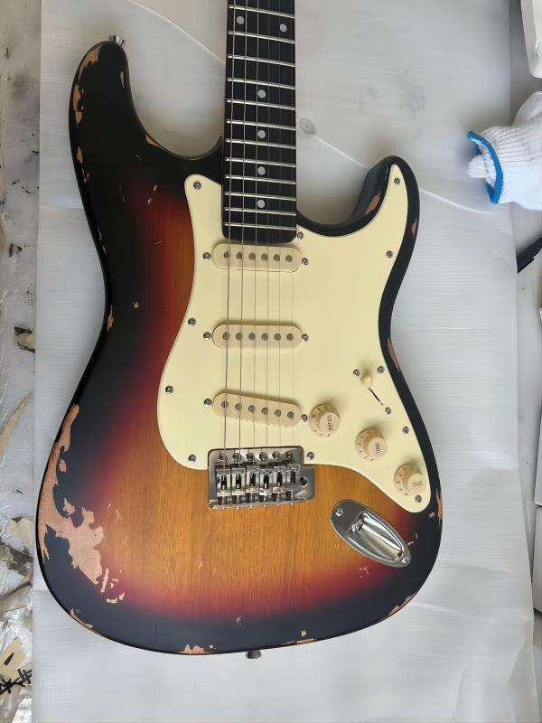 1954 Heavy Relic 60th Anniversary Two Tone Sunburst ST Electric Guitar Ash Body, Nitrocellulose Lacquer Finish, 6 Saddle Tremolo Bridge, Vintage Tuners369
1954 Heavy Relic 60th Anniversary Two Tone Sunburst ST Electric Guitar Ash Body, Nitrocellulose Lacquer Finish, 6 Saddle Tremolo Bridge, Vintage Tuners369