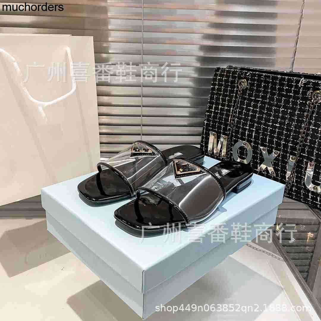 Triangle logo flat bottomed flip flops new summer 2023 color matching glass transparent light luxury high edition women's shoes for external wear, Gray
Triangle logo flat bottomed flip flops new summer 2023 color matching glass transparent light luxury high edition women's shoes for external wear, Gray