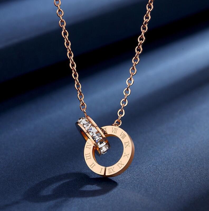 Luxury designer jewelry for women rose gold color double rings necklace titanium steel Crystal Diamond Stud Earrings Roman Numerals necklace 
Luxury designer jewelry for women rose gold color double rings necklace titanium steel Crystal Diamond Stud Earrings Roman Numerals necklace