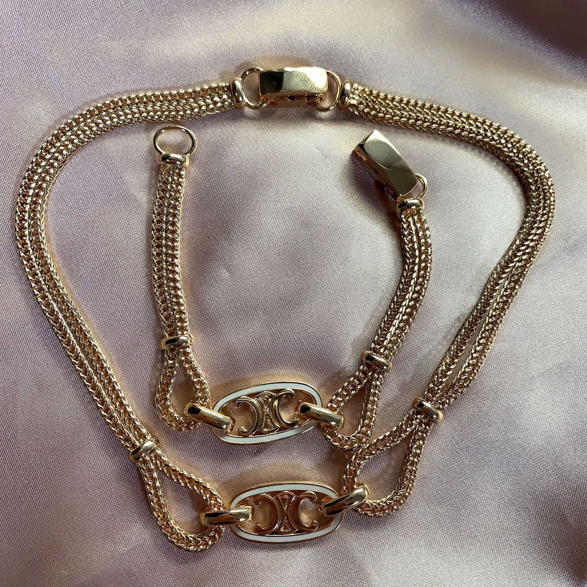 Celi high-grade Arc de Triomphe double bracelet necklace copper plated 18K Gold simple temperament clavicle chain
Celi high-grade Arc de Triomphe double bracelet necklace copper plated 18K Gold simple temperament clavicle chain