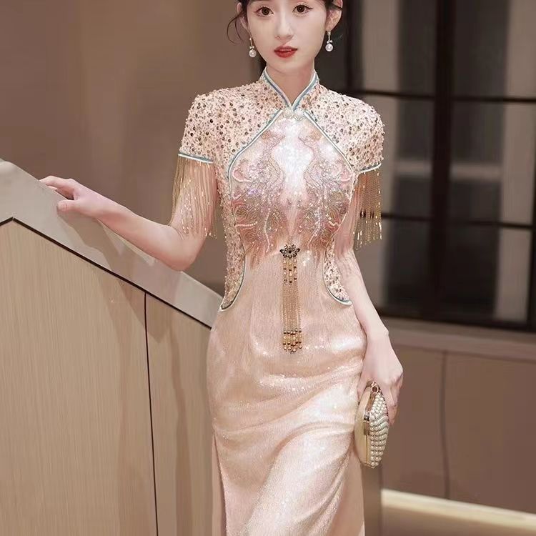 New Chinese style cheongsam with improved Chinese style, high-end temperament for young women, small summer dress, 2023 new tassels
New Chinese style cheongsam with improved Chinese style, high-end temperament for young women, small summer dress, 2023 new tassels