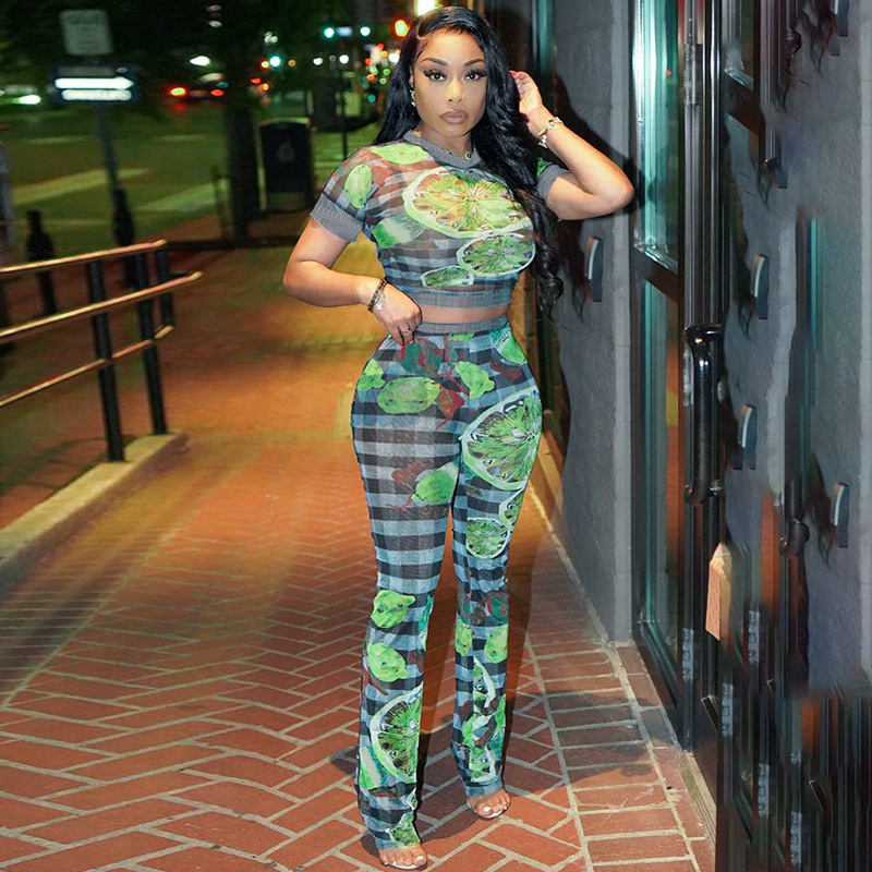 Fashion Women's Two Piece Pants Summer New Mesh Printing Perspective Short Sleeve Top and Trousers Casual Suit
Fashion Women's Two Piece Pants Summer New Mesh Printing Perspective Short Sleeve Top and Trousers Casual Suit