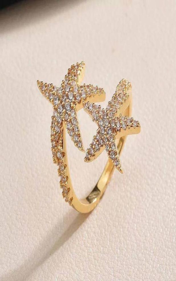 OIMG 2021 popular copper inlaid zircon starfish retro style ladies fashion ring classic highend jewelry gift6066513
OIMG 2021 popular copper inlaid zircon starfish retro style ladies fashion ring classic highend jewelry gift6066513