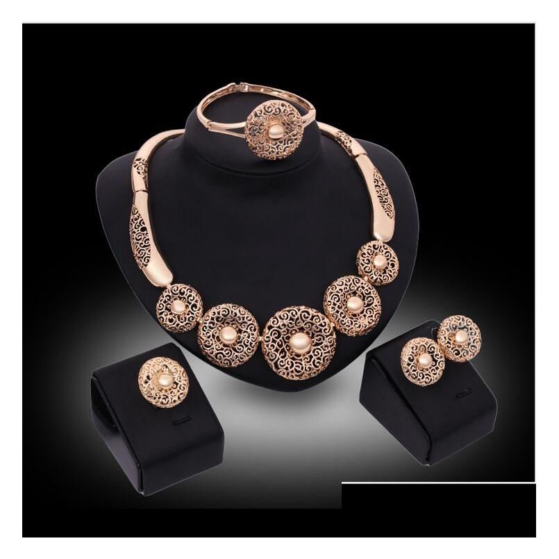 Bracelet Earrings Necklace Gift Three Nsional Carving Round Shape Jewelry Sets Bracelet Rings 18K Gold Family Of Four Drop Deliver Dhpoo, Golden
Bracelet Earrings Necklace Gift Three Nsional Carving Round Shape Jewelry Sets Bracelet Rings 18K Gold Family Of Four Drop Deliver Dhpoo, Golden