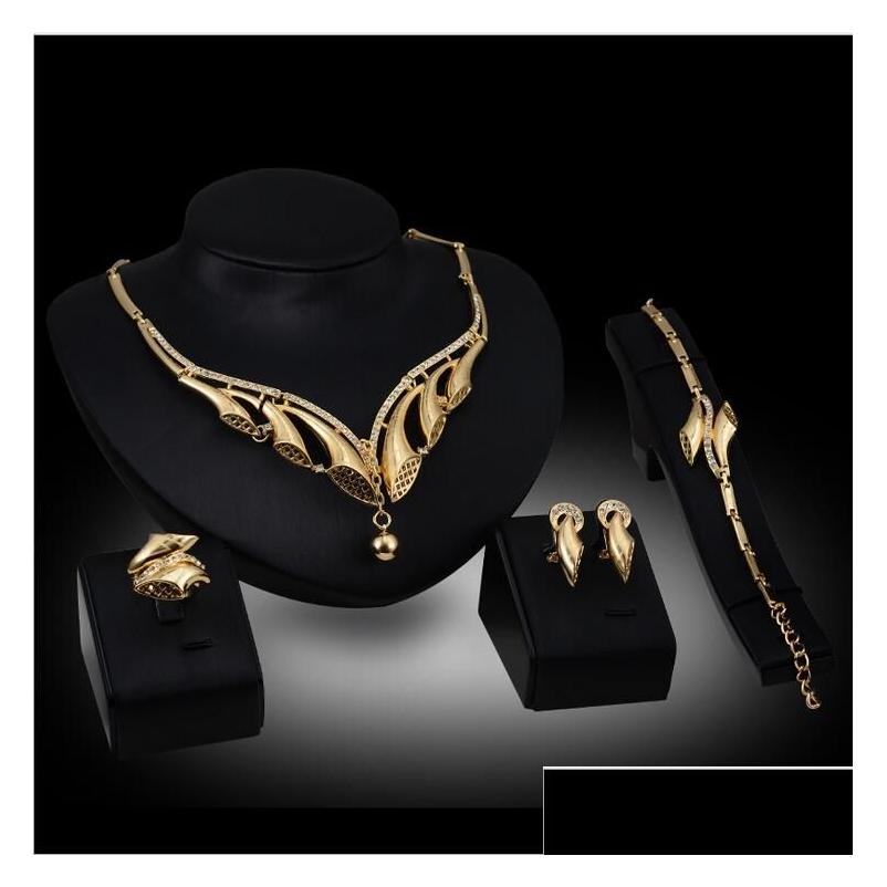 Wedding Jewelry Sets High Grade Horn White Gemstone Necklace Bracelet Earrings Rings 18K Gold Family Of Four Gtomks054 Drop Delivery Dh0Pj
Wedding Jewelry Sets High Grade Horn White Gemstone Necklace Bracelet Earrings Rings 18K Gold Family Of Four Gtomks054 Drop Delivery Dh0Pj