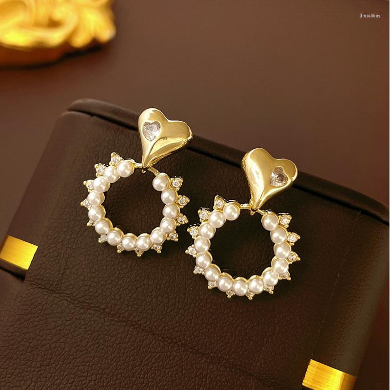 Stud Earrings Korean Fashion Sweet Zircon Love Pearl Circle 925 Silver Needle With True Gold Electroplating High Quality Earrings.
Stud Earrings Korean Fashion Sweet Zircon Love Pearl Circle 925 Silver Needle With True Gold Electroplating High Quality Earrings.