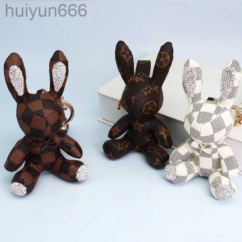 Car keychain Lanyards inlaid with diamond key hanging accessories PU Leather Car fashion Designer rabbit key hanging accessories
Car keychain Lanyards inlaid with diamond key hanging accessories PU Leather Car fashion Designer rabbit key hanging accessories