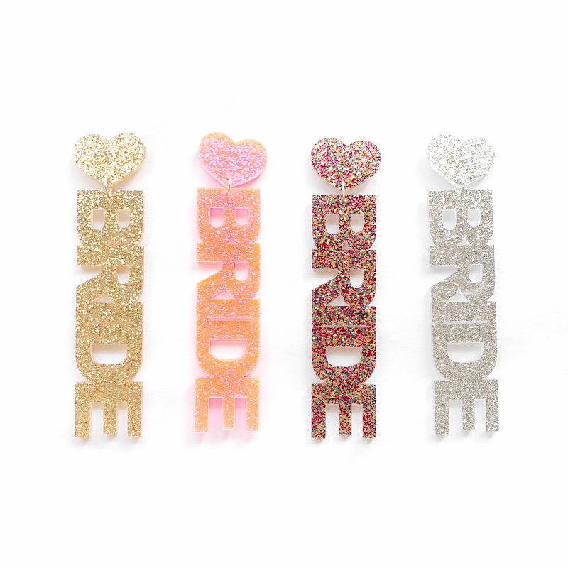 Trendy Pink Silver Champagne And Colorful Glitter Words Bride And White Bride Letters Acrylic Heart Stud Earrings For Women
Trendy Pink Silver Champagne And Colorful Glitter Words Bride And White Bride Letters Acrylic Heart Stud Earrings For Women