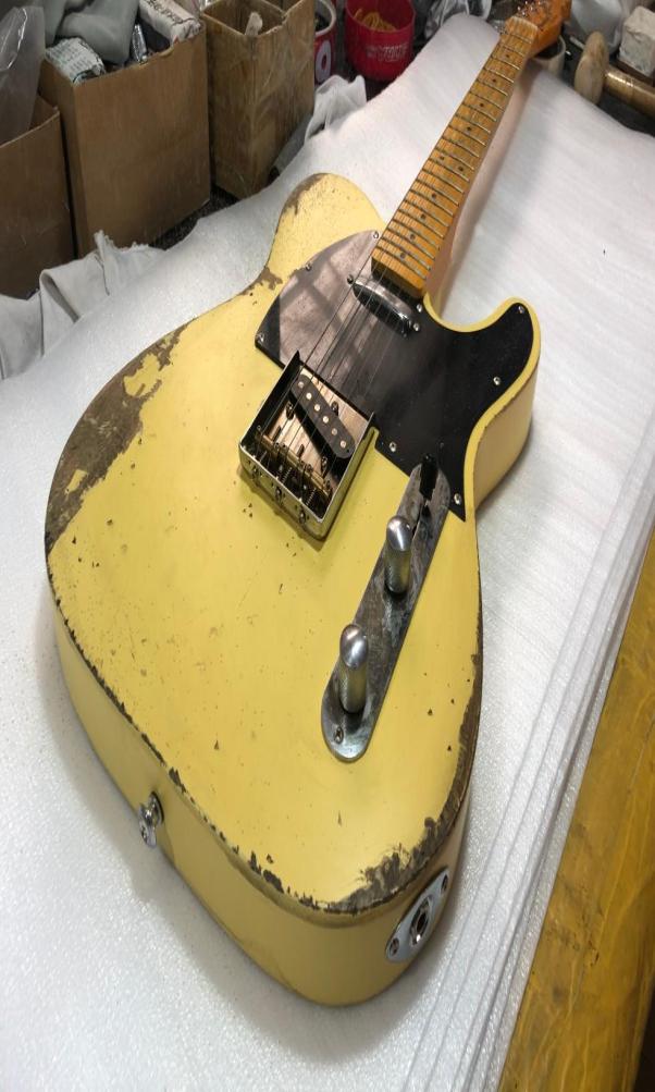Masterbuilt Heavy Relic Yellow 1953 Tele Electric Guitar Ash Body Maple Neck Fingerboard 3 Saddle Bridge Black Pickguard5103712
Masterbuilt Heavy Relic Yellow 1953 Tele Electric Guitar Ash Body Maple Neck Fingerboard 3 Saddle Bridge Black Pickguard5103712