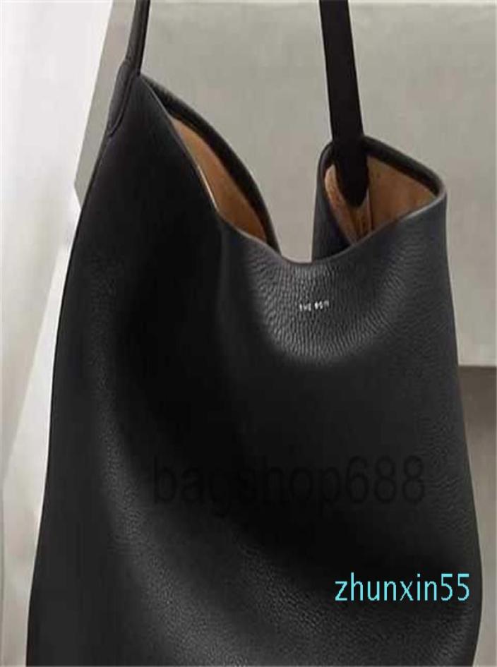 designer bags The Designer row leather large capacity tote bag n s Park Tote Bag minimalist leather bucket shoulder bag 20226496707, Dark grey
designer bags The Designer row leather large capacity tote bag n s Park Tote Bag minimalist leather bucket shoulder bag 20226496707, Dark grey