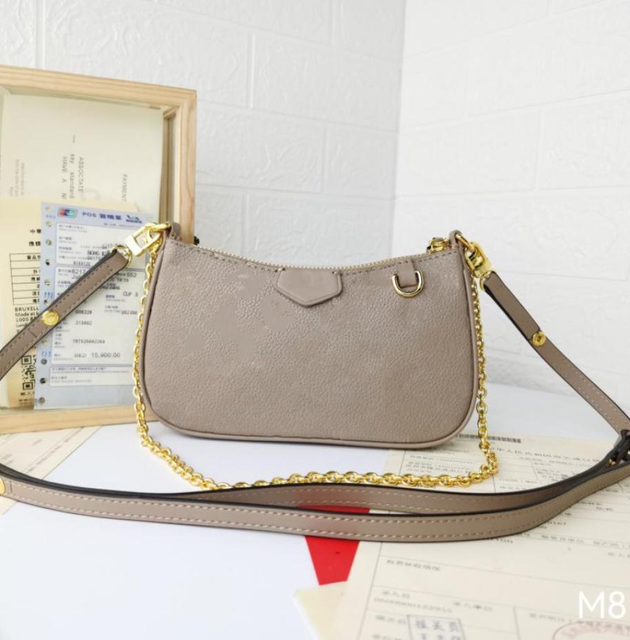 EASY Pouch Empreinte Leather Mini Shoulder Bags Women Designer Crossbody with Leather Long Strap Extra Gold Chain Purses4460139, White
EASY Pouch Empreinte Leather Mini Shoulder Bags Women Designer Crossbody with Leather Long Strap Extra Gold Chain Purses4460139, White