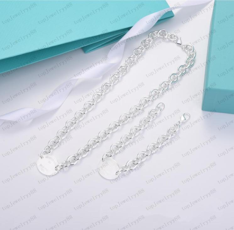 Luxury round necklace designer bracelet men039s and women039s pendant stainless steel chain couple Christmas gift with origi3551646
Luxury round necklace designer bracelet men039s and women039s pendant stainless steel chain couple Christmas gift with origi3551646