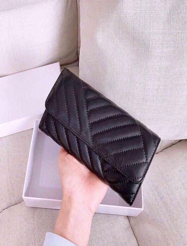 Torys Striped Stitching Classic Black Long Wallet Women Men Leather Purse Multicard Slot Luxury Leather Designer Crossbody Card H3367689
Torys Striped Stitching Classic Black Long Wallet Women Men Leather Purse Multicard Slot Luxury Leather Designer Crossbody Card H3367689