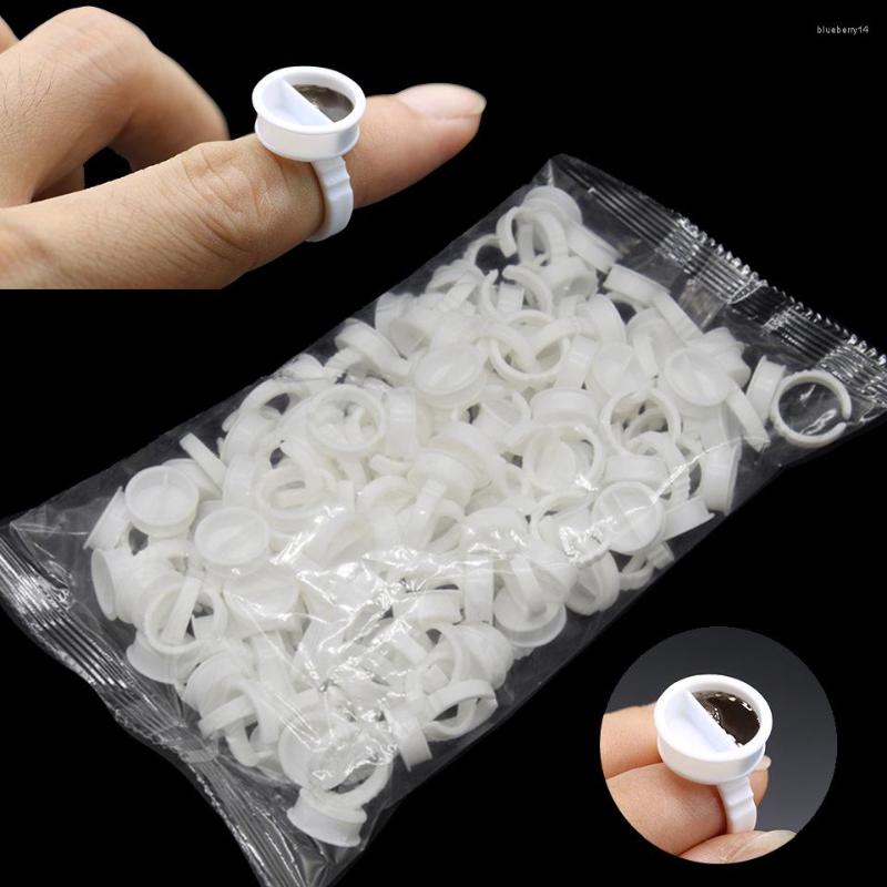 False Eyelashes 100PCS/bagWholesale Disposable Glue Holder Ring Pallet For Eyelash Extension Rings Adhesive Tattoo Pigment Well Tool
False Eyelashes 100PCS/bagWholesale Disposable Glue Holder Ring Pallet For Eyelash Extension Rings Adhesive Tattoo Pigment Well Tool