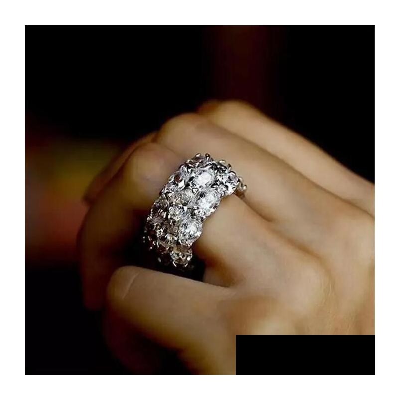 Wedding Rings Luxury Jewelry 925 Sterling Sier Fill Three Rows Oval Cut White Topaz Cz Diamond Gemstones Women Engagement Band Ring Dhmgj
Wedding Rings Luxury Jewelry 925 Sterling Sier Fill Three Rows Oval Cut White Topaz Cz Diamond Gemstones Women Engagement Band Ring Dhmgj