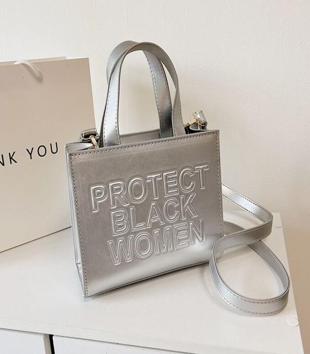 Summer Beach Crossbody Bag Leather Shopping Character Letter Handbag Women Protect Black People Tote Shoulder Bag Woman 201710cm9510123
Summer Beach Crossbody Bag Leather Shopping Character Letter Handbag Women Protect Black People Tote Shoulder Bag Woman 201710cm9510123