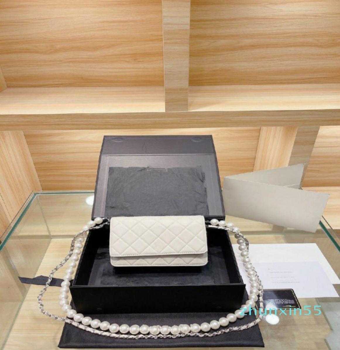 Women Luxurys Designers Bags Classic oneshoulder crossslung pearl rich bag 2013cm diamond plaid soft sheepskin of high quality 1890003, Sky blue
Women Luxurys Designers Bags Classic oneshoulder crossslung pearl rich bag 2013cm diamond plaid soft sheepskin of high quality 1890003, Sky blue