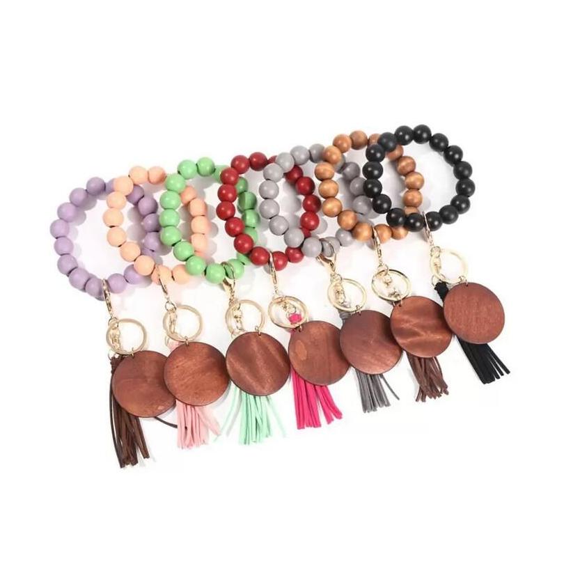 Keychains Lanyards Tassel Beaded Wooden Bracelet Diy Wood Key Rings With Fringe Keychain For Women 13 Colors Drop Delivery Fashion Dhzk2
Keychains Lanyards Tassel Beaded Wooden Bracelet Diy Wood Key Rings With Fringe Keychain For Women 13 Colors Drop Delivery Fashion Dhzk2