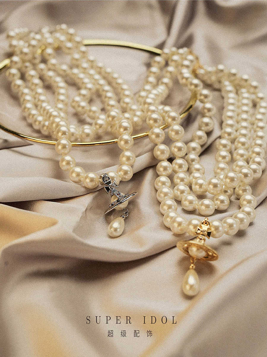 The new queen mother of the West engraved classic Saturn water drop pearl necklace single-layer three-layer clavicle sweater chain beauty
The new queen mother of the West engraved classic Saturn water drop pearl necklace single-layer three-layer clavicle sweater chain beauty