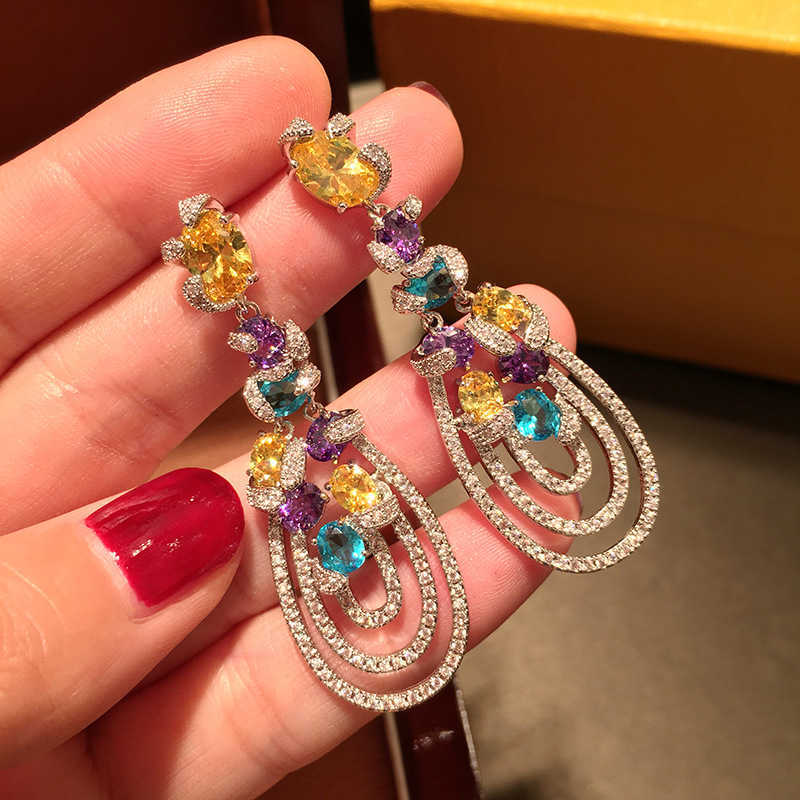 temperament colorful tassel earrings long drip shaped dinner earrings silver needle earrings female
temperament colorful tassel earrings long drip shaped dinner earrings silver needle earrings female