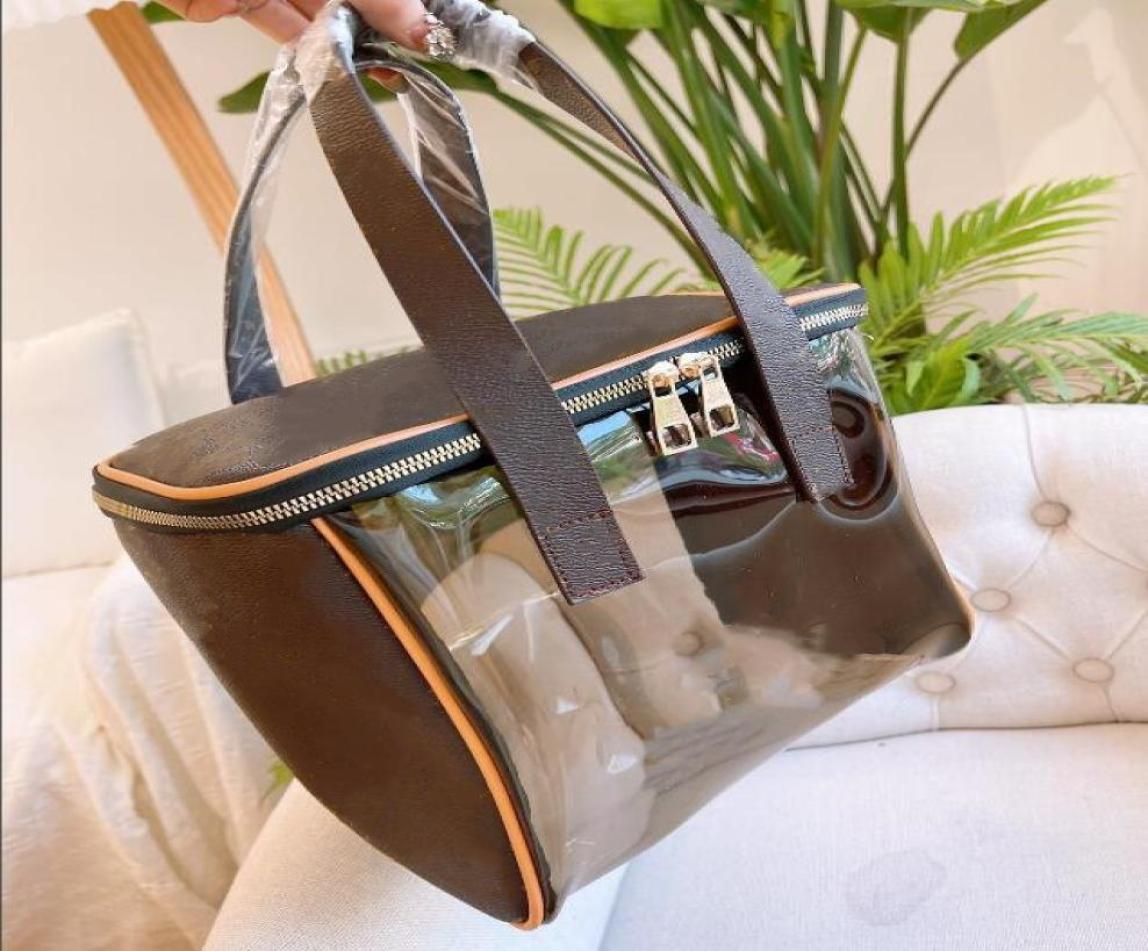 Top quality PVC jelly Newest Whole cosmetic bag Luxury Designer women big travel organizer tote shoulder bags for storage wash2276414, Brown
Top quality PVC jelly Newest Whole cosmetic bag Luxury Designer women big travel organizer tote shoulder bags for storage wash2276414, Brown