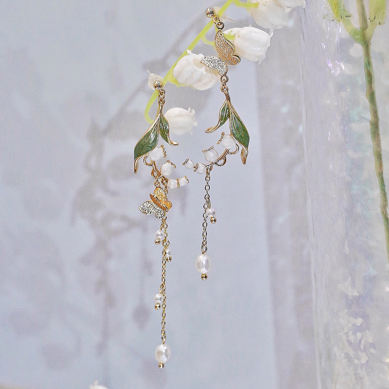 2022 new pearl asymmetric tassel butterfly flower temperament elegant fashion earrings
2022 new pearl asymmetric tassel butterfly flower temperament elegant fashion earrings