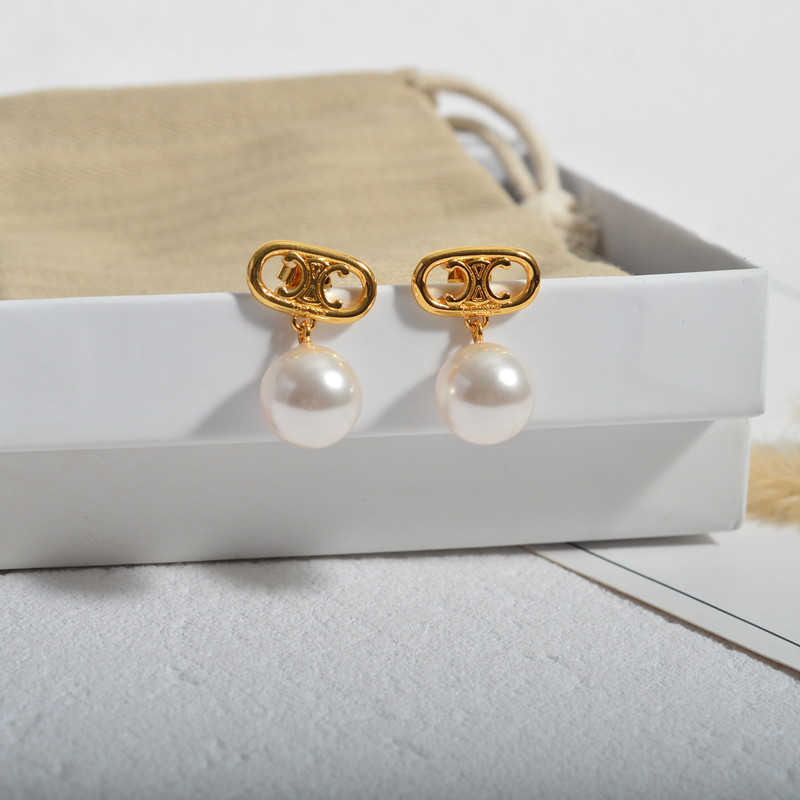 CELI Arc de Triomphe series hanging pearl earrings brass plated with 18K real symbol simple and earrings
CELI Arc de Triomphe series hanging pearl earrings brass plated with 18K real symbol simple and earrings