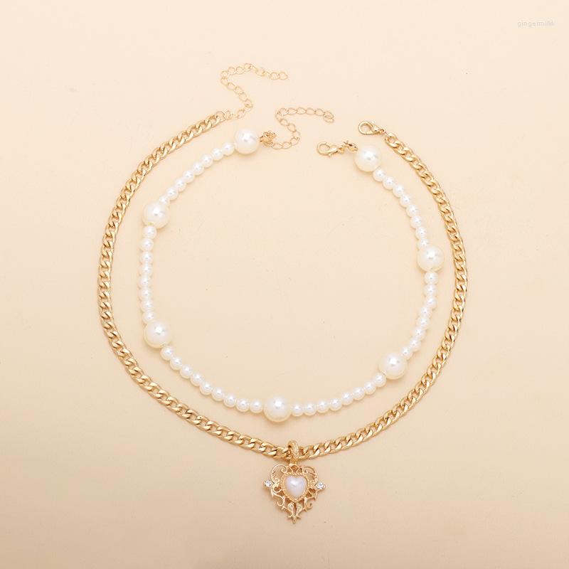 Chains Women's 2pcs Faux Pearl Layered Necklaces Heart Choker Necklace Gold Plated Layering Jewelry
Chains Women's 2pcs Faux Pearl Layered Necklaces Heart Choker Necklace Gold Plated Layering Jewelry