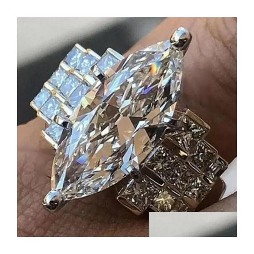 Wedding Rings Luxury Jewelry 925 Sterling Sier Large Marquise Cut White Topaz Cz Diamond Gemstones Party Eternity Women Engagement B Dhabp
Wedding Rings Luxury Jewelry 925 Sterling Sier Large Marquise Cut White Topaz Cz Diamond Gemstones Party Eternity Women Engagement B Dhabp