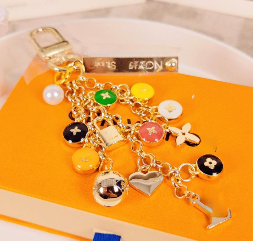 Fashion Keychains High-quality A String of Beads Lanyards Electroplating Metal Can Be Used As Key Chain Pendant or Bag Decoration
Fashion Keychains High-quality A String of Beads Lanyards Electroplating Metal Can Be Used As Key Chain Pendant or Bag Decoration