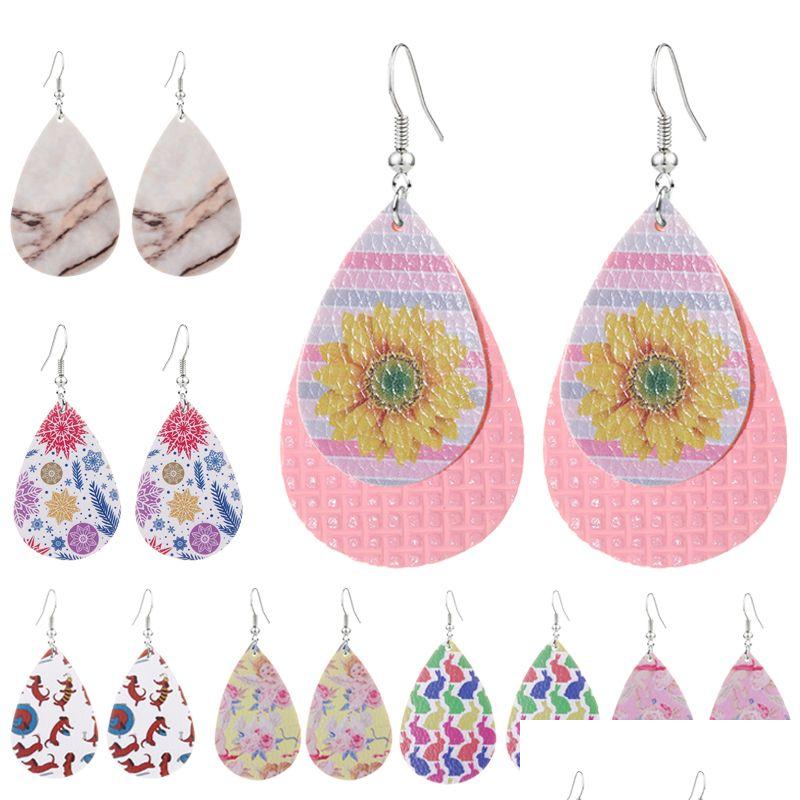 Charm Lightweight Pu Leather Water Drop Earrings For Women Simple Animal Sunflower Cupid Printed Earring Girls Jewelry Accessory Deli Dhoa4
Charm Lightweight Pu Leather Water Drop Earrings For Women Simple Animal Sunflower Cupid Printed Earring Girls Jewelry Accessory Deli Dhoa4