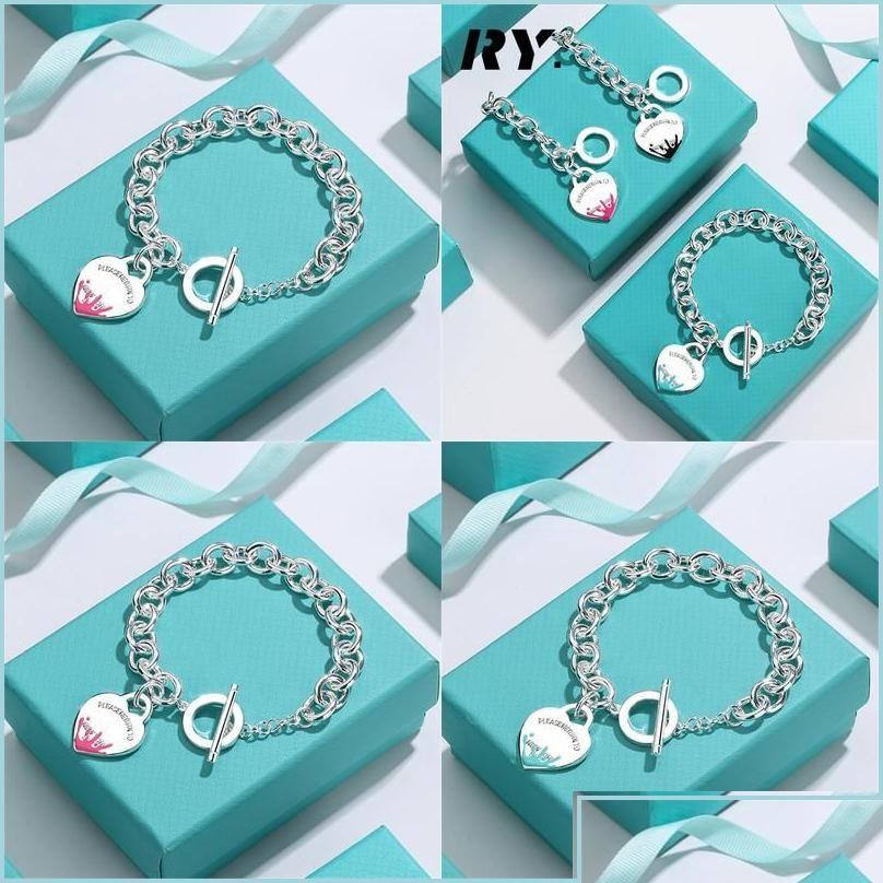 Pendant Necklaces Arts And Crafts Charm Bracelets Needle Buckle Water Drop Enamel Heart Bracelet Fine Jewelry For Women Black Blue P Dhgwm
Pendant Necklaces Arts And Crafts Charm Bracelets Needle Buckle Water Drop Enamel Heart Bracelet Fine Jewelry For Women Black Blue P Dhgwm