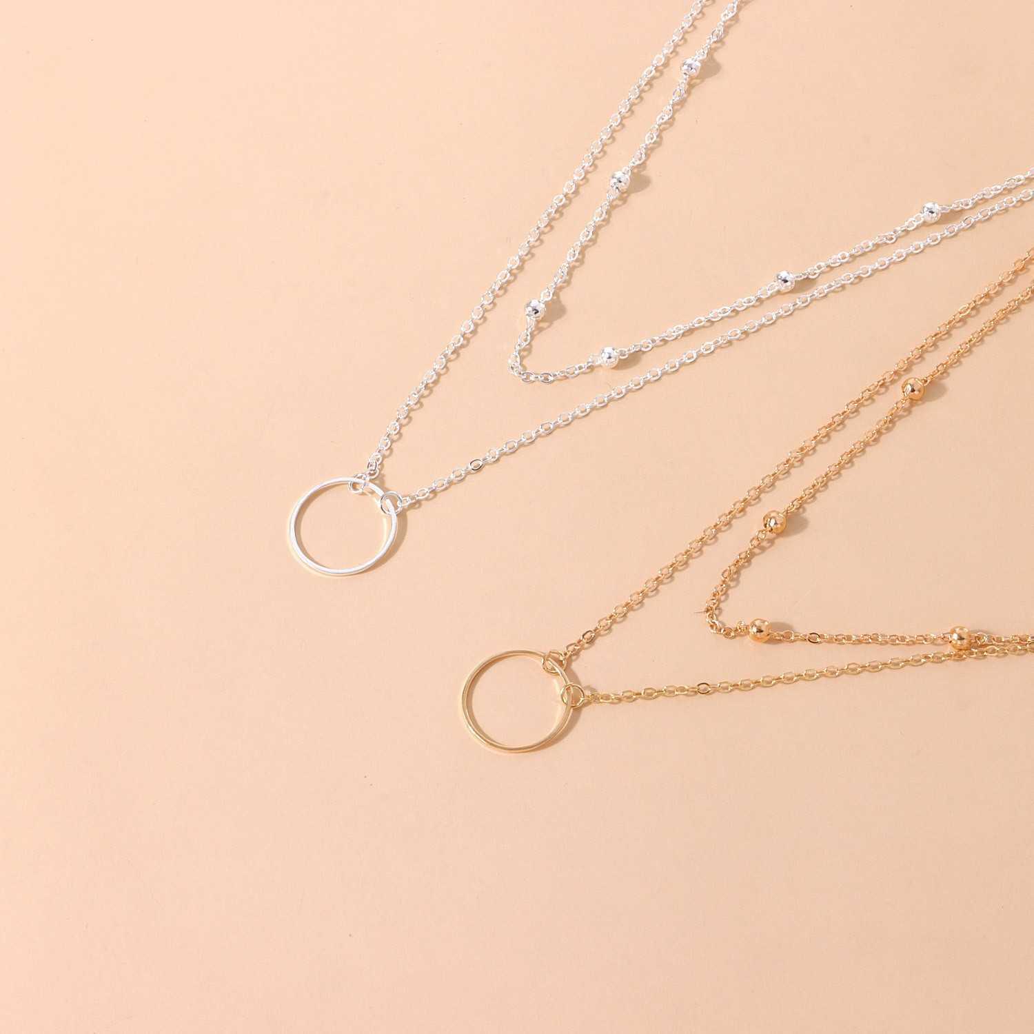 Pendant Necklaces Double Bead Chain Hollow Circle Pendant Female Money Necklace Foreign Trade Popular Simple Jewelry AA230526
Pendant Necklaces Double Bead Chain Hollow Circle Pendant Female Money Necklace Foreign Trade Popular Simple Jewelry AA230526