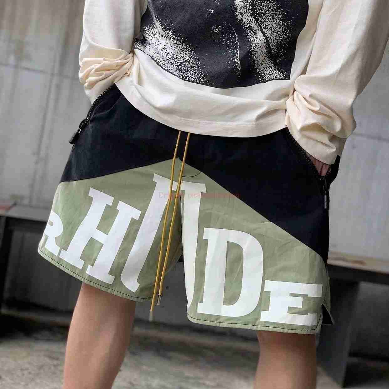 Designer Short Fashion Casual Clothing Beach shorts Rhude Fitness Shorts for Mens Summer New High Street Rgude Basketball Sports Casual Letter Breathable Trendy Br
Designer Short Fashion Casual Clothing Beach shorts Rhude Fitness Shorts for Mens Summer New High Street Rgude Basketball Sports Casual Letter Breathable Trendy Br