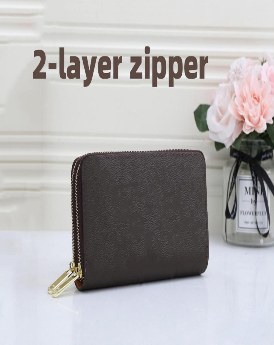 Luxurys Designers women wallets 2layer zipper wallet High quality Monogrames wristle men purse passport ID credit card holder clu8590416, Lavender
Luxurys Designers women wallets 2layer zipper wallet High quality Monogrames wristle men purse passport ID credit card holder clu8590416, Lavender