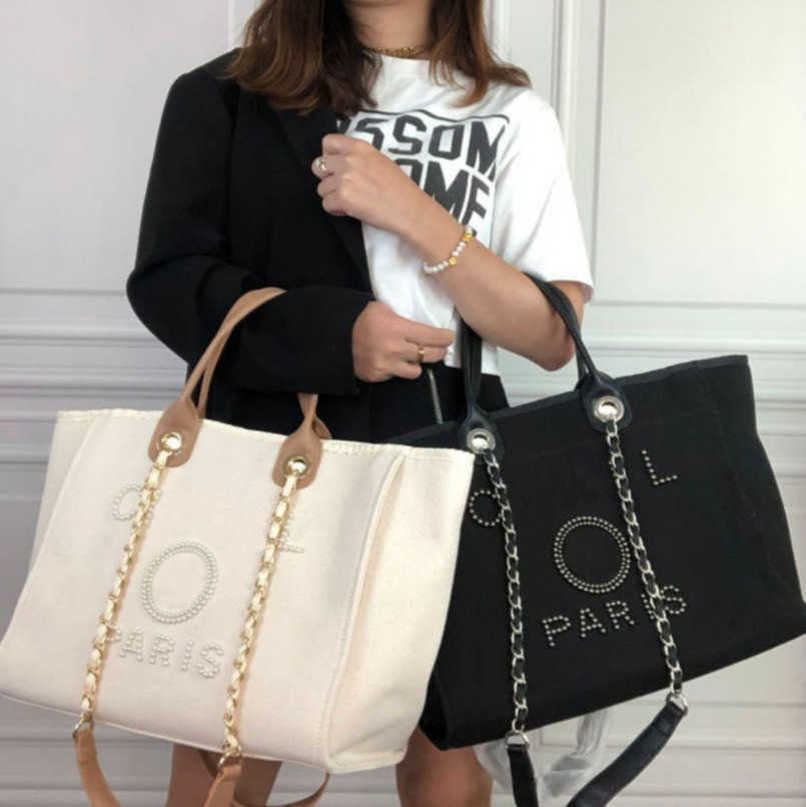 Women's Luxury Classic Hand Bags Canvas Beach Bag Brand Tote Handbags Fashion Female Large Backpacks Capacity Small Chain Packs Big Shopping Crossbody Handbag D5PA
Women's Luxury Classic Hand Bags Canvas Beach Bag Brand Tote Handbags Fashion Female Large Backpacks Capacity Small Chain Packs Big Shopping Crossbody Handbag D5PA
