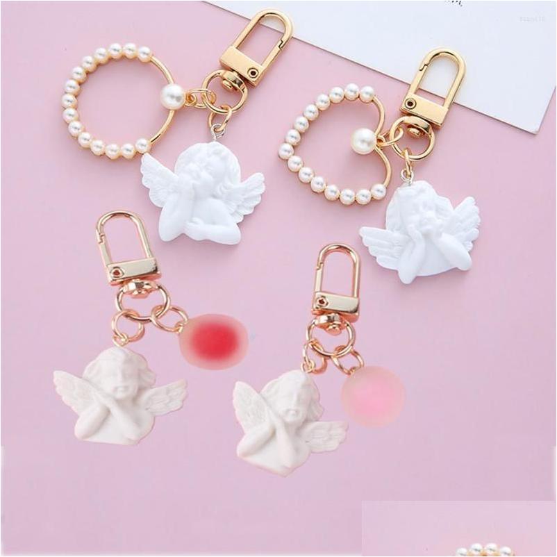 Keychains Lanyards Cute Vintage White Angel Keychain For Women Girls Mini Pearl Heart Jelly Ball Pendant Gold Color Keyring Bag Ca Dhinm
Keychains Lanyards Cute Vintage White Angel Keychain For Women Girls Mini Pearl Heart Jelly Ball Pendant Gold Color Keyring Bag Ca Dhinm